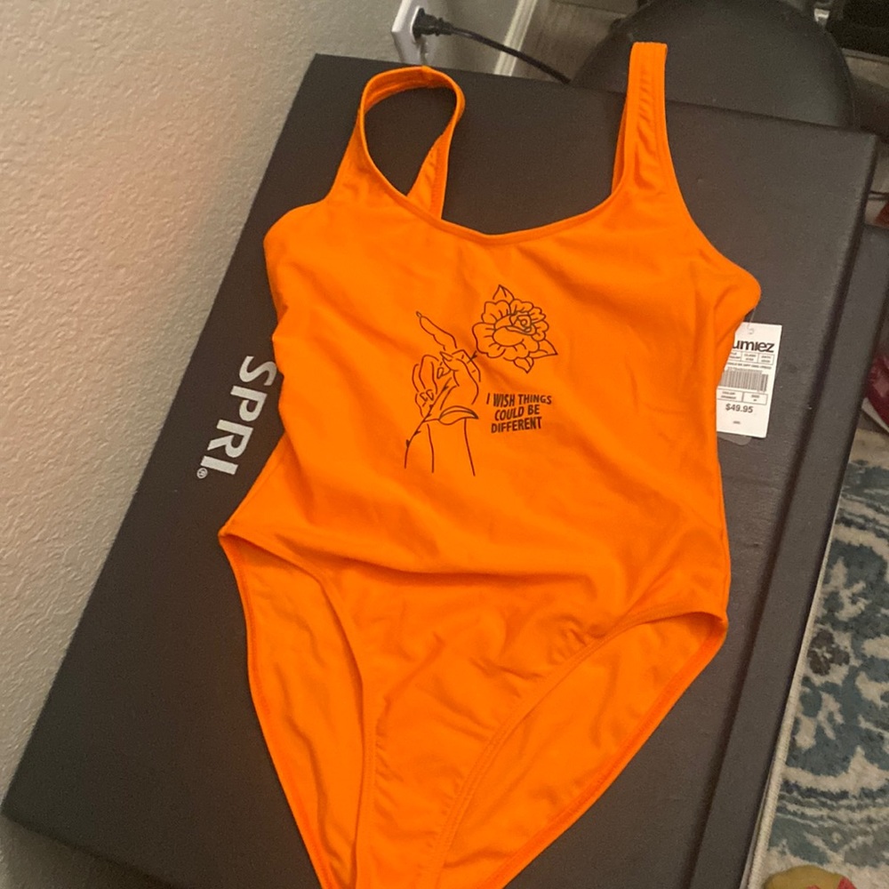 Zumiez 1 piece orange bathing suit. M size, brand new with tags.
